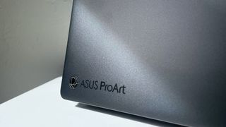 Close up of the ProArt logo on the back of the ASUS ProArt P16