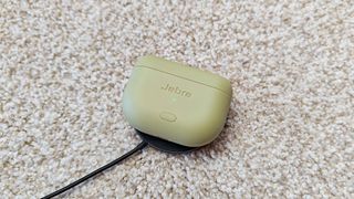 Jabra Elite 8 Active Gen 2 being wirelessly charged