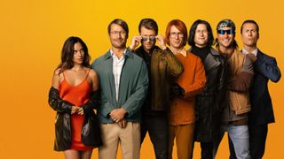 Hit Man movie still of the cast on a yellow background