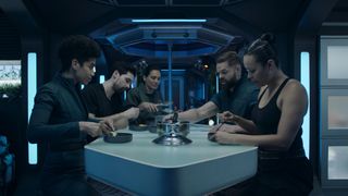 the expanse: rocinante crew eating at a table