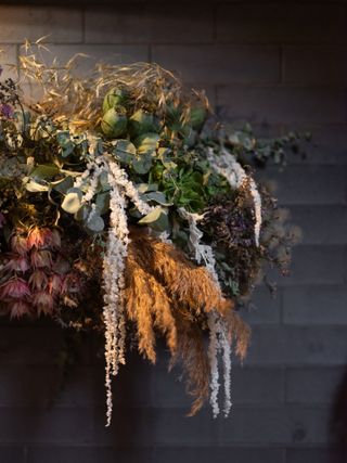 Satoshi Kawamoto creating his plant installation at Sachi restaurant at the Pantechnicon in London, photography Andrew Urwin