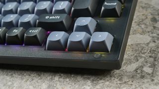 A Keychron V1 wired mechanical keyboard, in the frosted black (translucent) colorway