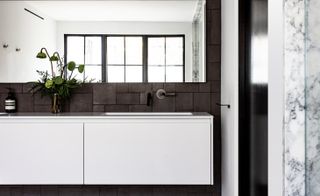 Black and white bathroom in Los Angeles apartment