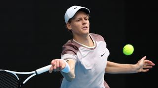 Jannik Sinner of Italy plays a forehand ahead of the Australian Open men's final 2024 – 