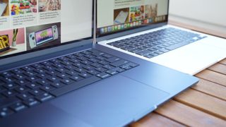 MacBook Air 15-inch M3 next to MacBook Air 13-inch M3 on a side table