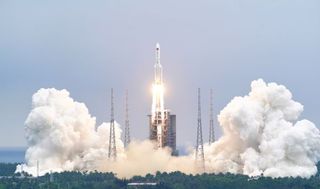 A Long March 5B rocket launches Tianhe, the core module of China's new space station, on April 28, 2021.