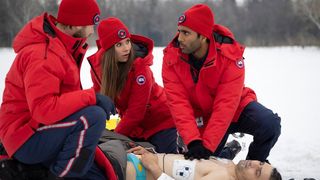 The cast of &quot;SkyMed&quot; season 2 attend to a patient in on a snowy mountain top