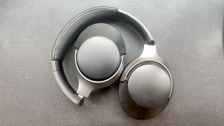 Creative Zen Hybrid SXFI headphones on a white table