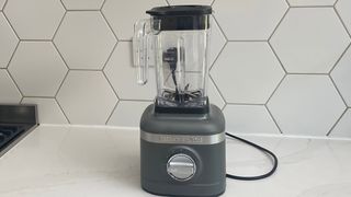 The KitchenAid K150 blender on a kitchen countertop