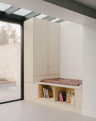 Minimalist white interior with seating nook