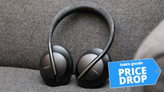 A photo of the Bose 700 headphones on a fabric background