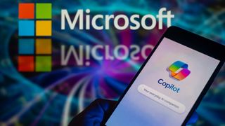 The Microsoft Copilot app is being displayed on a smartphone, with the Microsoft logo visible in the background, in this photo illustration taken in Brussels, Belgium, on December 30, 2023.