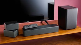 Ultimea Poseidon D50 sound system alongside Amazon Fire TV