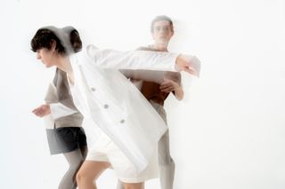 Three boys wearing Véronique Nichanian Hermès menswear on white background