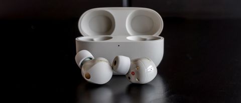 Sony WF-1000XM5 wireless earbuds in silver hero image.