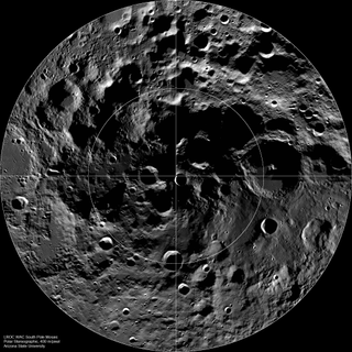 a view of the moon's pole based on images. black space surrounds the dust and craters. descriptive text is at bottom left