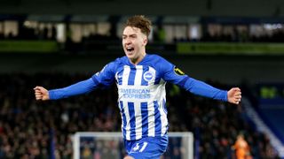 Jack Hinshelwood of Brighton &amp; Hove Albion, in blue kit runs down the pitch to celebrates scoring ahead of the Brighton vs Marseille live stream.