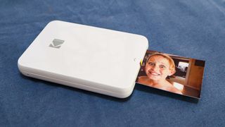 Kodak STEP Slim mobile photo printer with paper