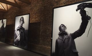 Portraits of models against a brick wall