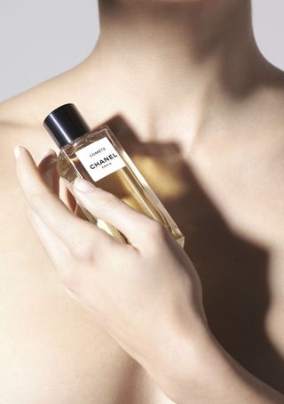 Chanel Comète eau de parfum held in a hand