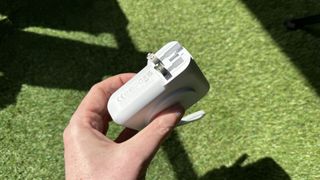 Journey AXIE 3-in-1 portable charger on grass