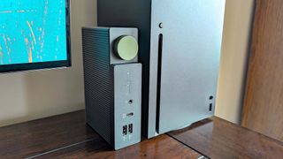 BenQ beCreatus DP1310 Docking Station next to Xbox.