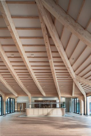 views of the sherborne in dorset with historical facade and modern rooftop addition