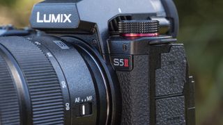 Panasonic Lumix S5 II camera on a table with close up of the S5 II badge