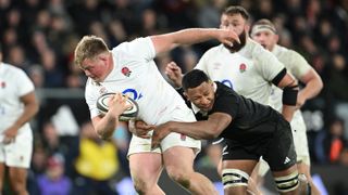 Fin Baxter of England is tackled during the International Test Match between New Zealand All Blacks and England ahead of the 2nd Test New Zealand vs England