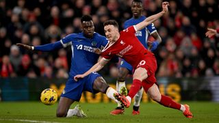 Benoit Badiashile brings down Diogo Jota during Liverpool vs Chelsea 2024