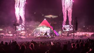 Fireworks mark the end of the Foo Fighters' Pyramid Stage performance at Glastonbury Festival, England.