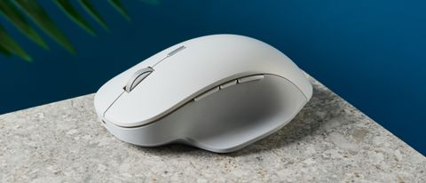 A white wireless Microsoft Surface Precision mouse