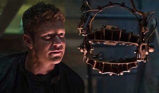 Matt Passmore standing next to a reverse bear trap in Jigsaw.