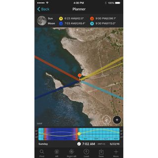 Screenshot showing the Planner page of the PhotoPills app with an orange pin placed on a map.