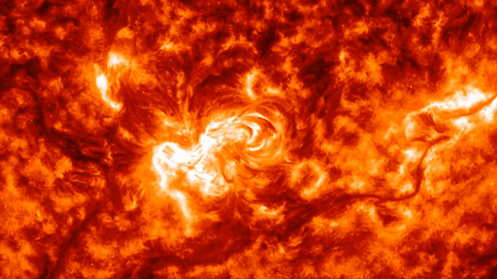 gif animation showing a fiery looking expulsion of material from the sun in a close up view.
