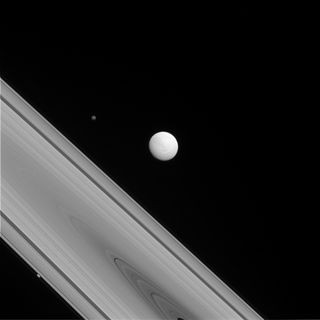 Cassini View of Rings and 3 Saturn Moons