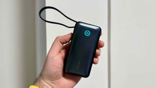 Anker Nano Power Bank in hand.