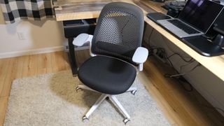 The Haworth Breck office chair in front of an L-shaped desk