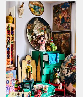 artist at work in his colourful studio