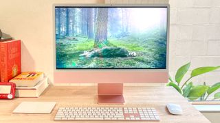 Apple iMac M3 review unit on desk, one of the best computers you can buy right now