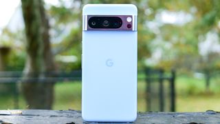 Google Pixel 8 Pro held in hand.