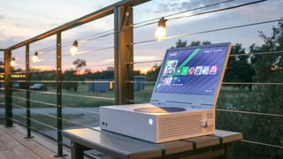 Playing the Xbox Series S with the xScreen attached on a rooftop