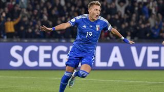 Mateo Retegui celebrates a goal for Italy