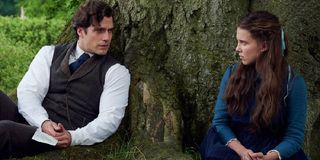 Henry Cavill with Millie Bobby Brown in Enola Holmes.