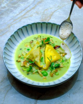 Eggplant and Sheep’s Milk Ravioli Serviettes with spring fricassee, local mushrooms and pine nut froth