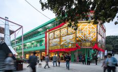 At the heart of the Bi-City Biennale of Urbanism\Architecture in Shenzhen, an installation conceived by a Beijing designer Guang Yu and crafted by a Hong Kong floral board master Choi Wing Kei hovers above the UABB café hosting further artistic interventions