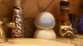 Echo Dot on Mission Battery base on bathroom counter