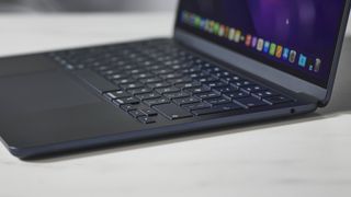 Apple MacBook Air (M2, 2022) on a white desk in a studio