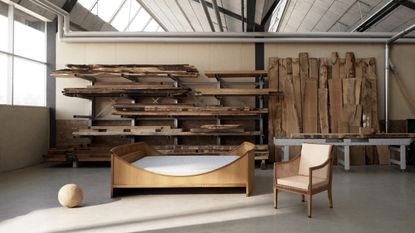 Kaare Klint bed and chair reissued by Carl Hansen & Søn in workshop setting