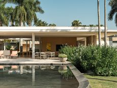 casa das palmeiras all low, white forms and open areas in the tropical climate of sao paolo